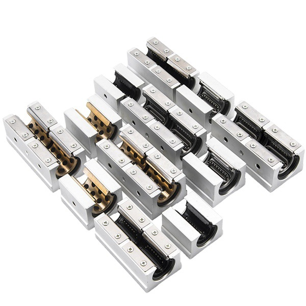 Various types of SBR bearing blocks lined up – blank, standard, sealed, and custom options